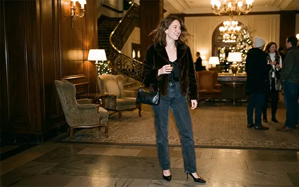 A woman in a fancy going out outfit in winter season